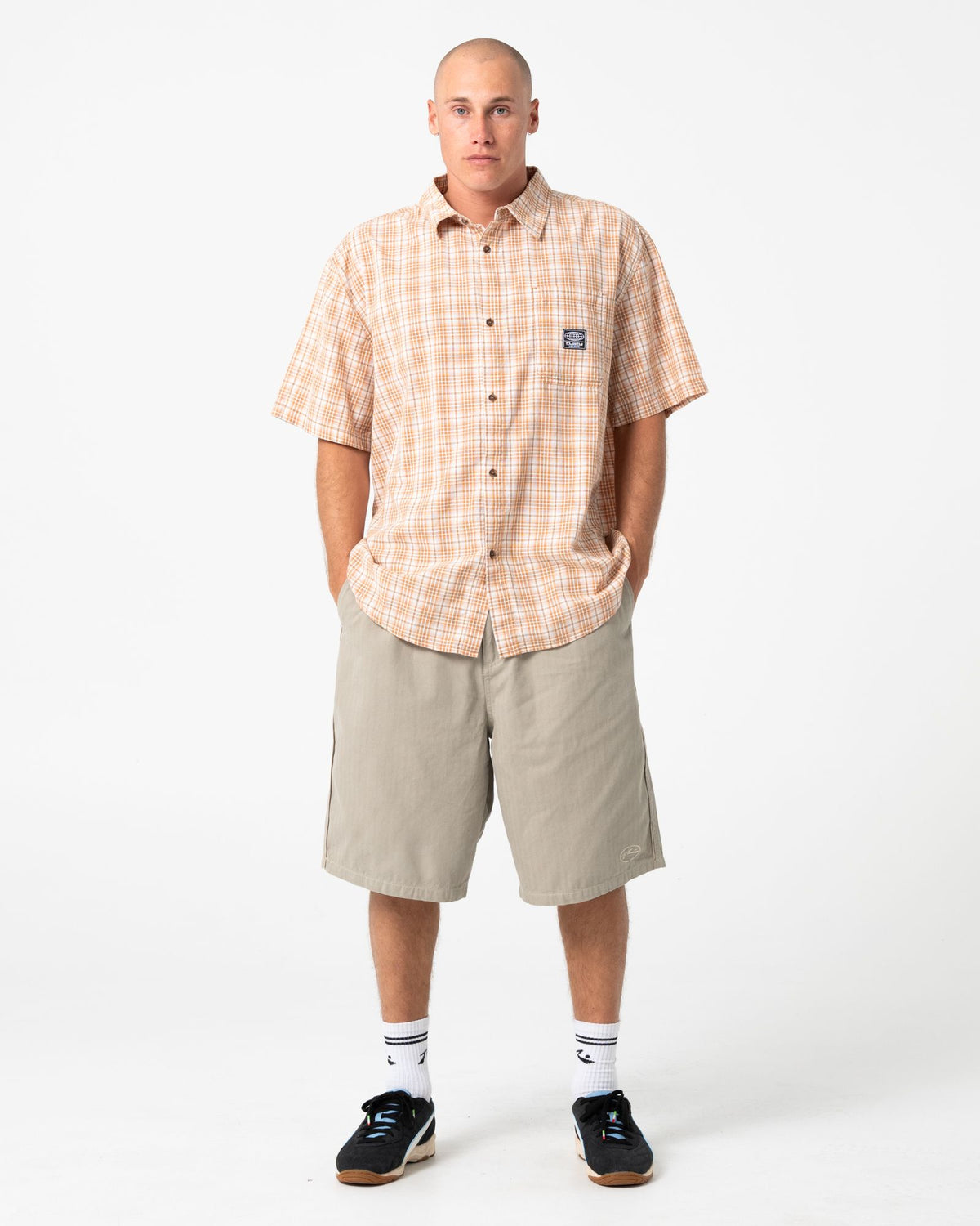 WORLDWIDE CURVED HEM SHORT SLEEVE SHIRT
